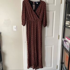 Francesca’s “Blue Rain” large printed jumpsuit